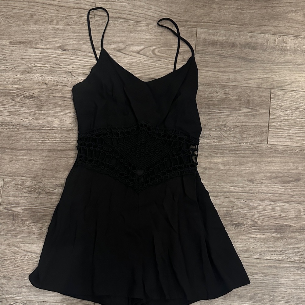 Black romper with lace middle